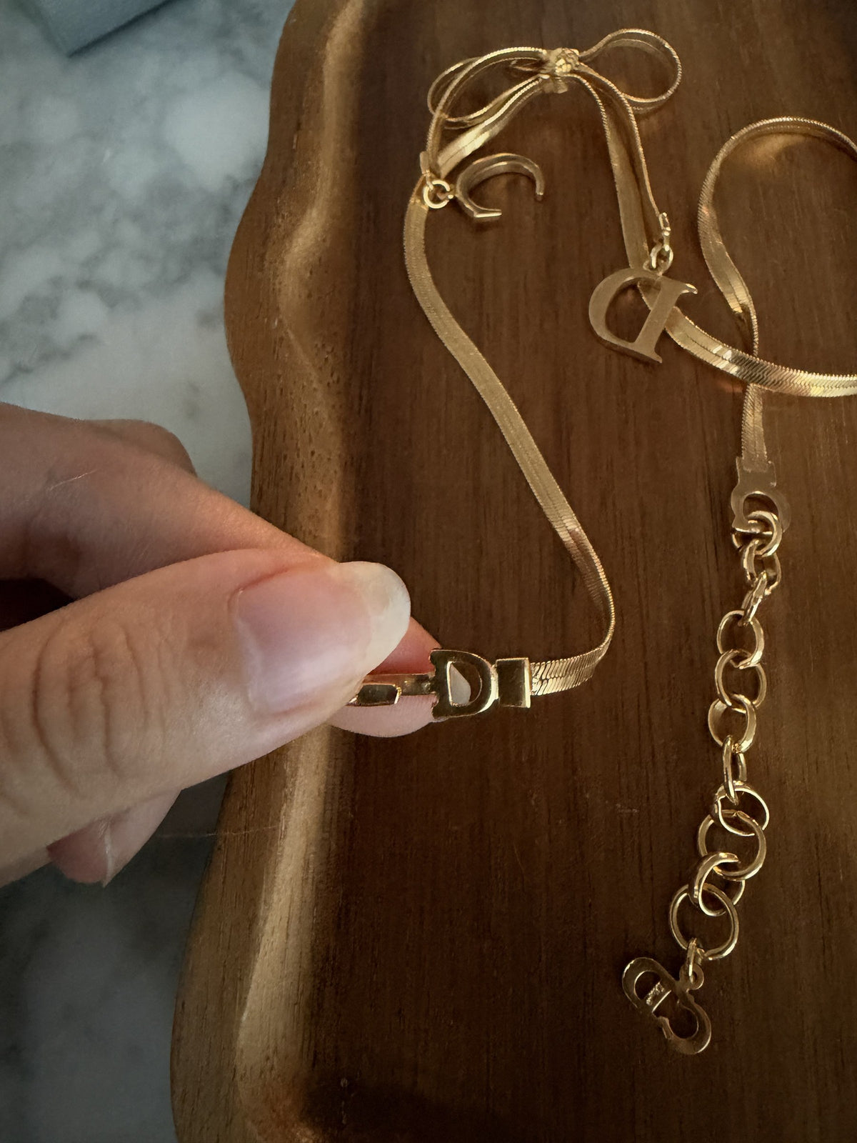 Bow necklace with C and D charms