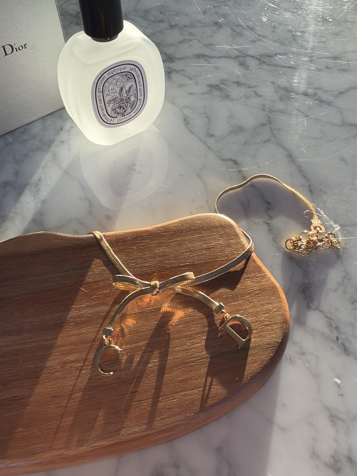 Bow necklace with C and D charms