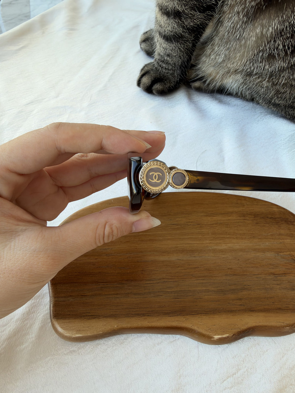 Tortoiseshell sunglasses with CC medallions