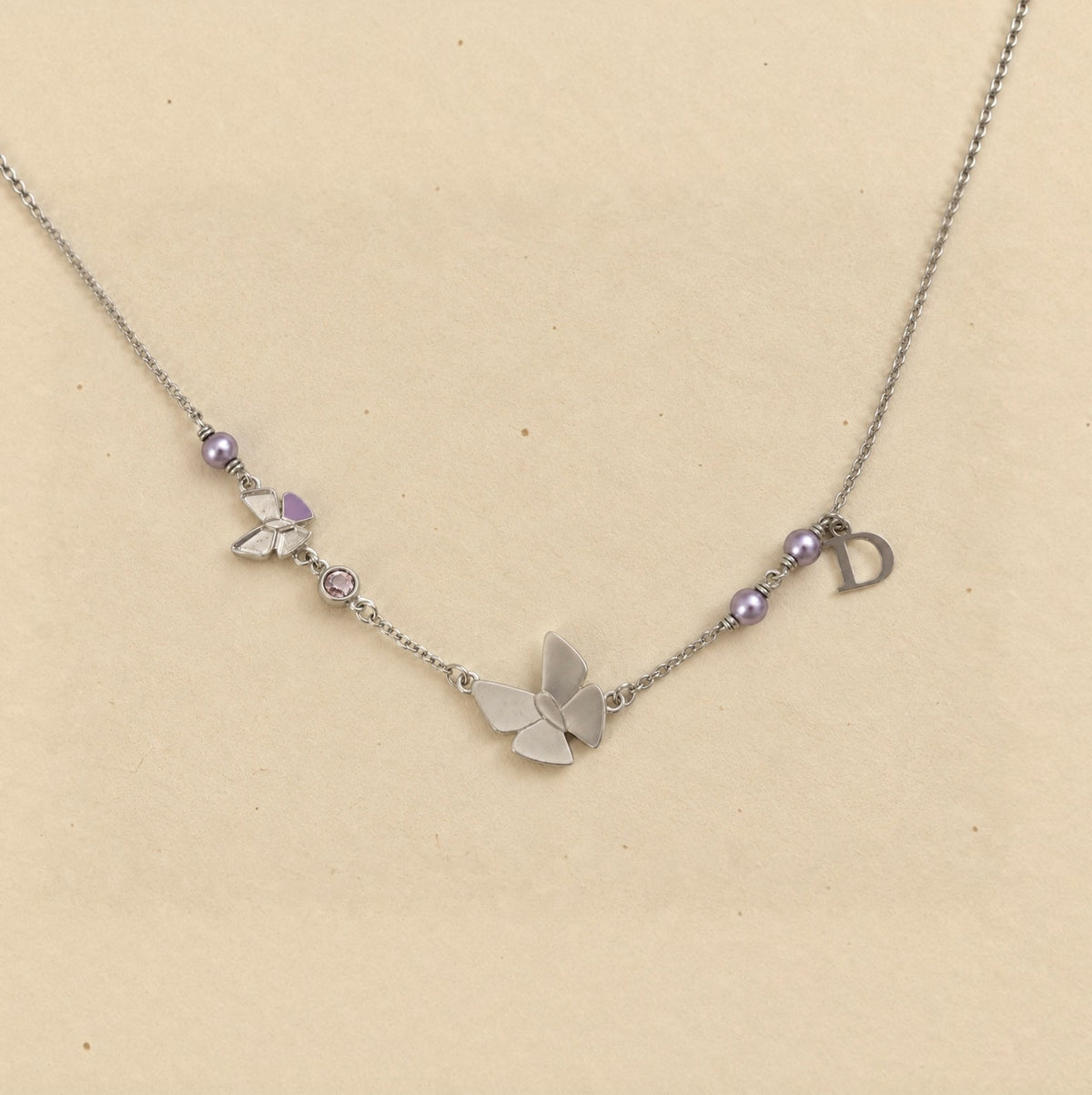 Butterfly necklace with D charm