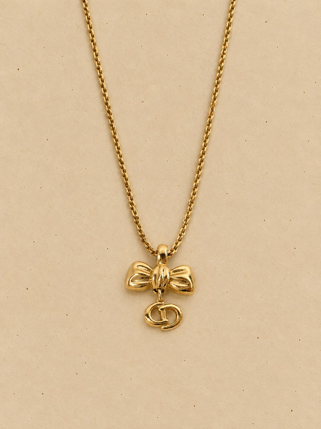 Bow and CD pendant